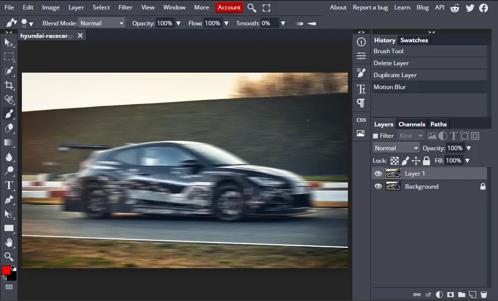 image of racecar with motion blur