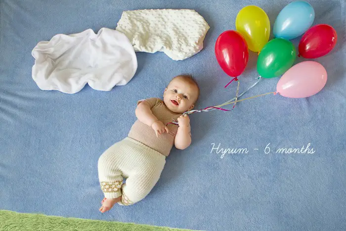 6 months old baby photo with balloons
