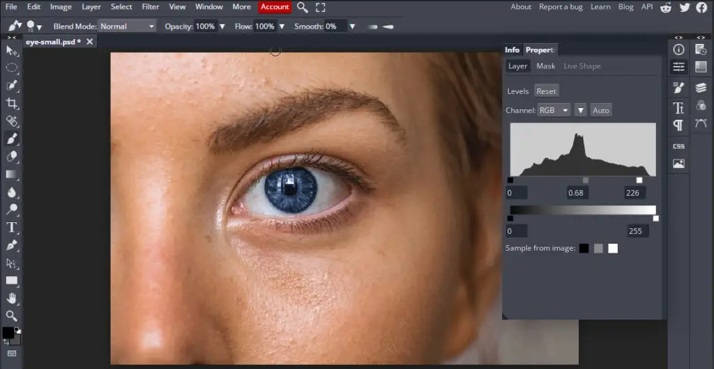 deep dark blue eyes in online Photoshop tool using levels layer