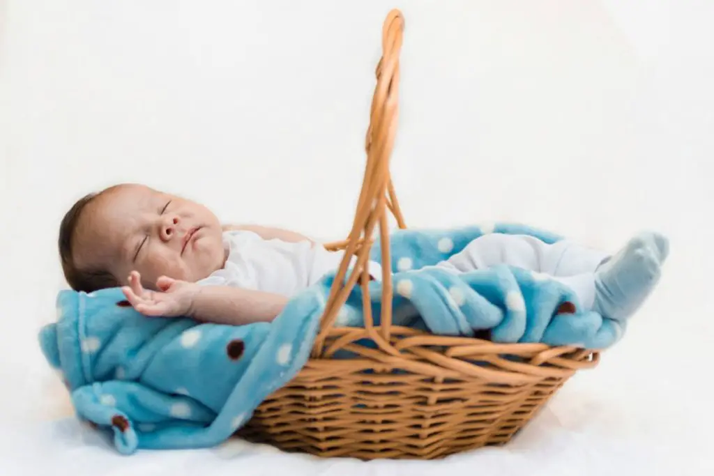 newborn baby picture with basket